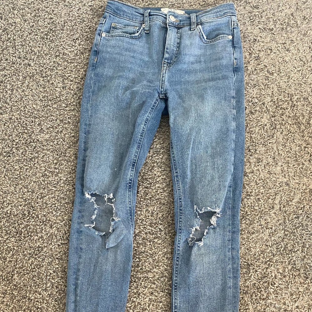 Light blue ripped skinny jeans